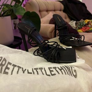 Black lace up heels. Worn 2 times and in great condition.